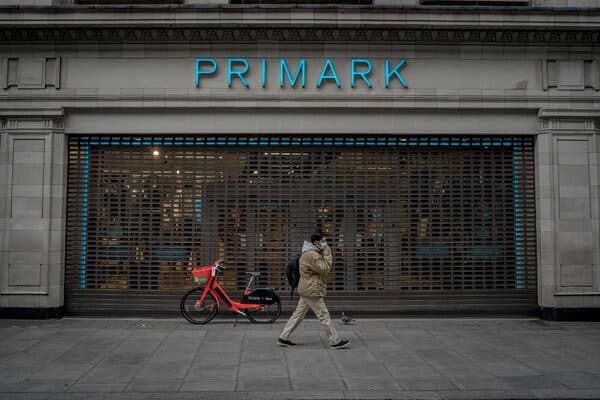 Closed shops in London on the first day of the new restrictions.